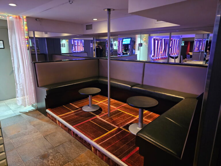 Private booth with wraparound seating at Alley Katz Windsor